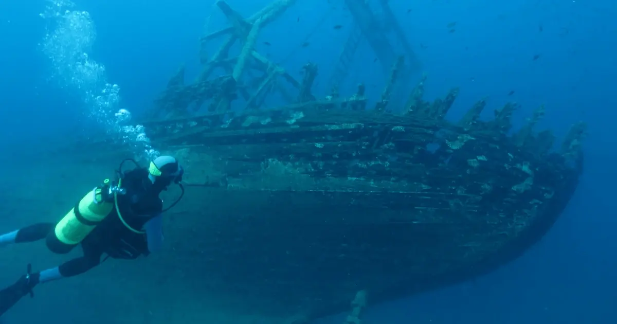 scuba diver and ship wreck
